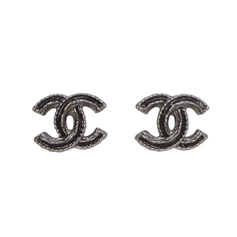 black chanel earrings|chanel symbol earrings.